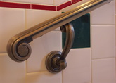 Custom Railing Brackets to Match Door Levers. Arctitect: David Martin, Designer Frank K. Pennino